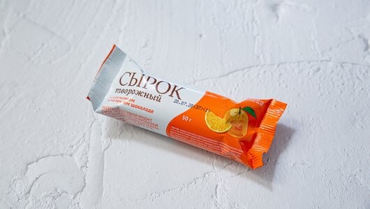 Сырок глазированный ВкусВилл с апельсином в молочном шоколаде 12.6% 50г